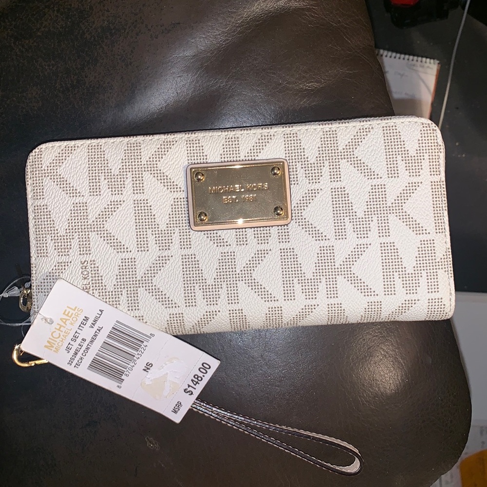 Brand new Michael Kors wallet with wristlet strap